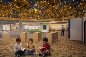 Exciting Updates Coming your Orange County Public Library. Three students reading together