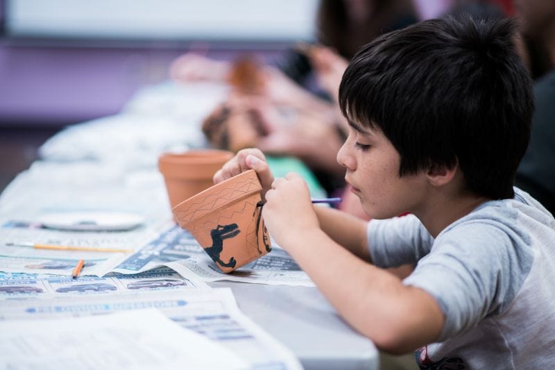 Kids can paint pottery at the Orange County Library Demigod Camp at Nehrling Gardens