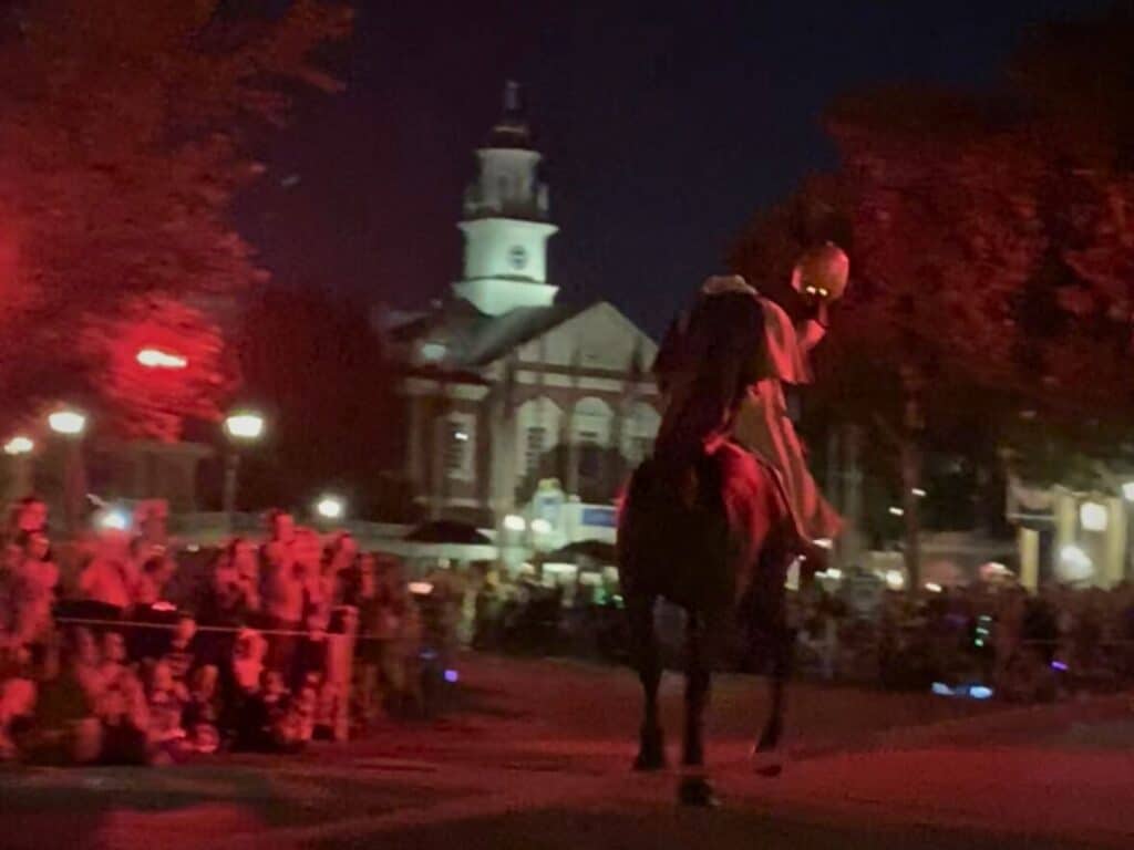 Headless-Horseman-During-Mickeys-Not-So-Scary-Halloween-Party-image-by-Terri-Peters - Orlando Parenting Magazine Headless Horseman riding down the streets of Magic Kingdom During Mickey's Not So Scary Halloween Party