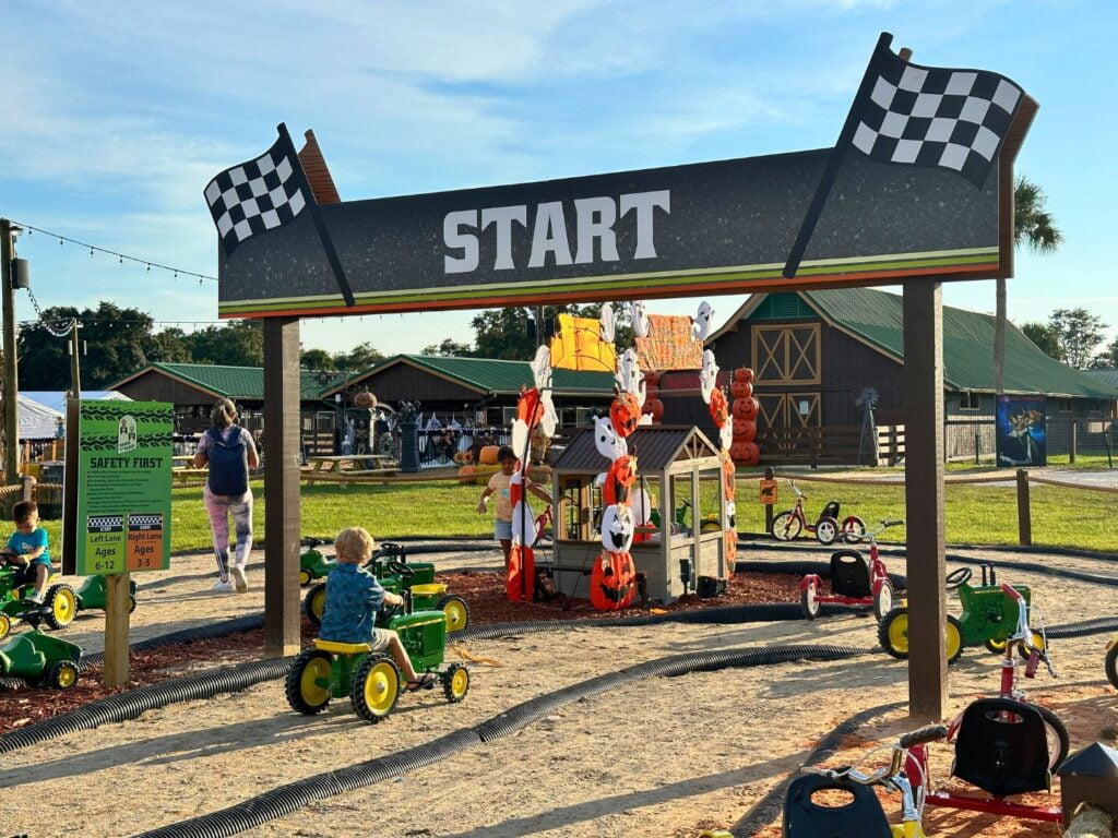 tractor race for kids Cowboy Adventure Park near Orlando with Halloween decorations - image by Dani Meyering