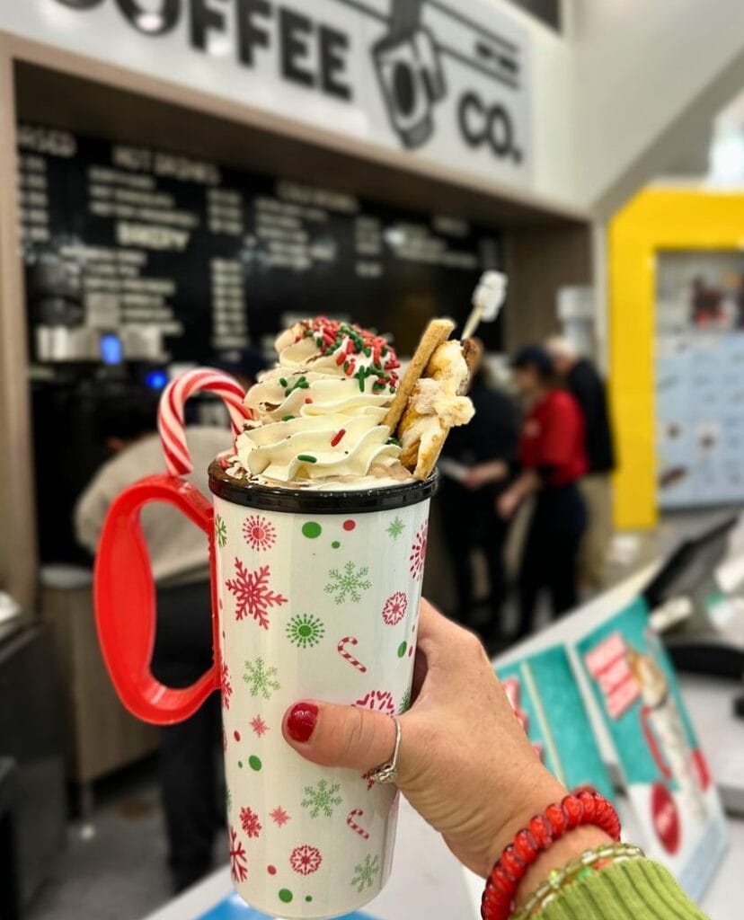 Photographer holds the Fireside Hot Cocoa at LEGOLAND Florida during holidays - image by Dani Meyering