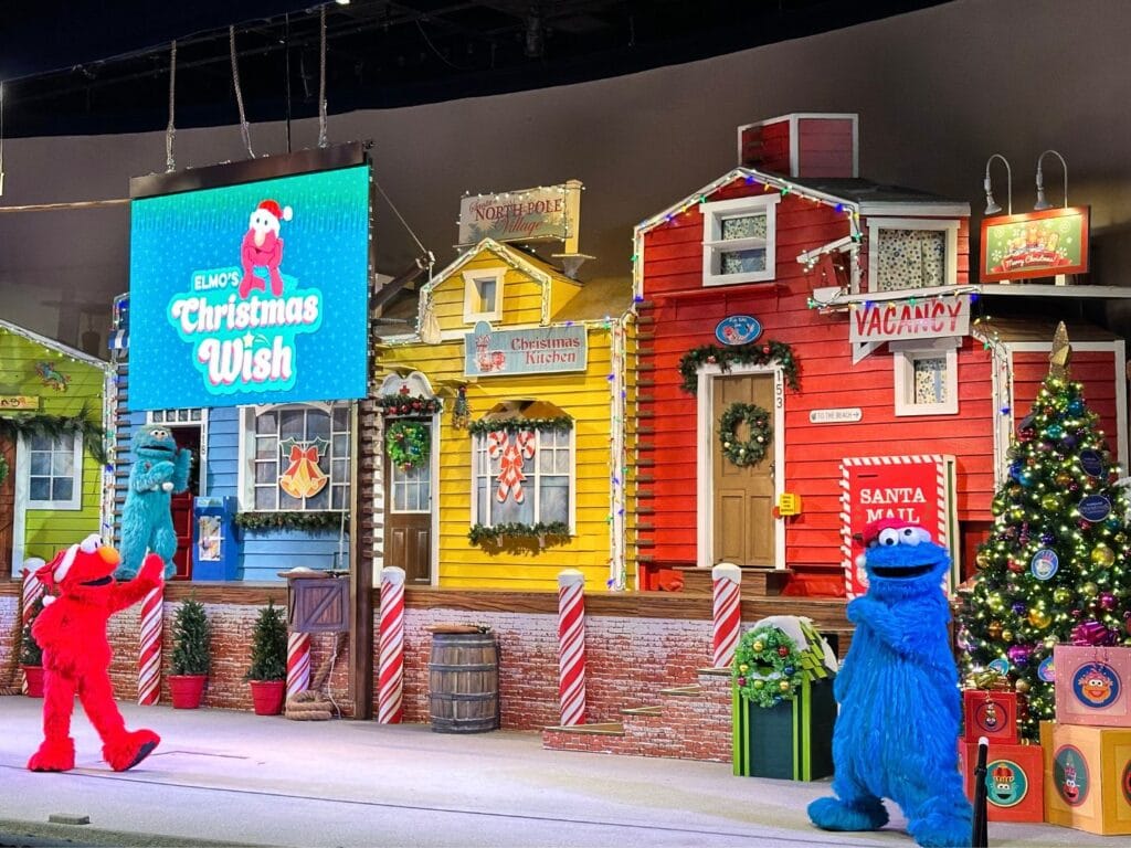 Elmo's Christmas Wish with Cookie Monster on stage SeaWorld Orlando Christmas tips for parents - image by Dani Meyering